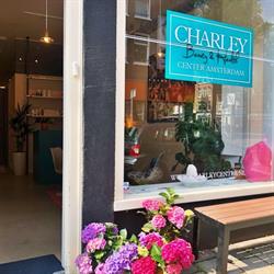 Charley Huf, Amsterdam openingstijden